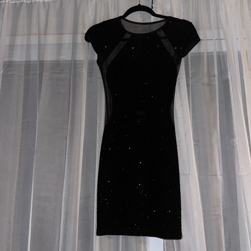 Little black dress with sheer sides and back